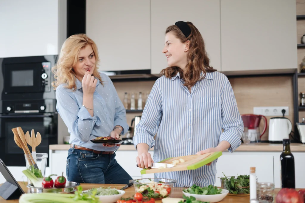About 3 mother and daughter teenager cooking together 2024 10 14 05 57 25 utc