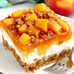 Peach Pretzel Salad Recipe – A No-Bake Summer Favorite! 6 u1127111147 ultra realistic peach pretzel salad slice in vibr 06b53d79 fbe5 4c99 9e2b 97957e216edc 0
